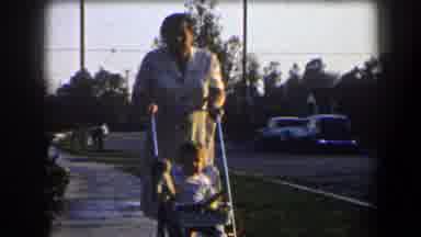 California (1958): Little Boy Gets Taken Care Of By Being Walked And Fed