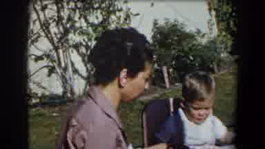 California (1958): A Father Plays With His Little Baby In The Stroller