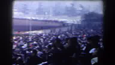 California (1958): Crowd Packed Into Stands Stand And Watch The Track Before Or