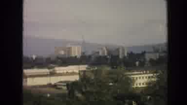 Hawaii (1961): Capacity Is Seen With Buildings And Then A Woman Sunbather With A