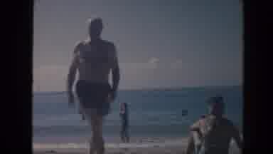 Hawaii (1961): A Bear-Chested Man Walks On The Sands Leaving Other Behind