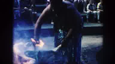Hawaii (1961): Two Men Creating Fanning Ceremonial Fire In Front Of Audience