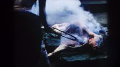 Hawaii (1961): Tribal Men Cooks Meat On A Banana Leaf