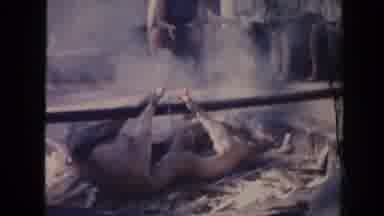 Hawaii (1961): View Of Hog Removed From Luau Pit On A Sunny Day