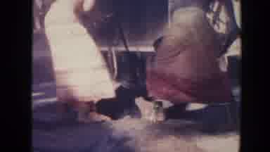 Hawaii (1961): Group Of Hawaiians Shoveling Dirt Into A Pit Or BBQ