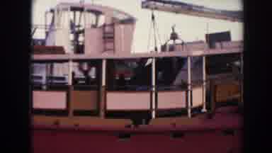 Hawaii (1961): Archival Footage Of A Large Red Ship Sitting Peacefully In A Harbor