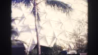Hawaii (1961): Classic Vehicles Sitting Outside Of A Space Age Looking Building