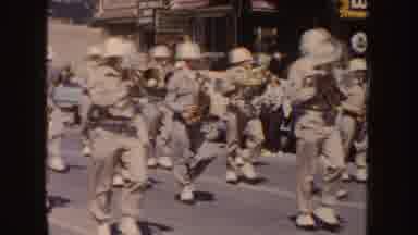 South Dakota (1954): In The Middle Of A Street There Is A Parade Of Musicians