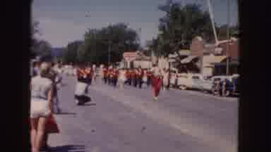 South Dakota (1954): Man Parading And Behind Him Other People Parading In What