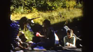 South Dakota (1954): People Eating Daytime Picnic Meal Then Throw Items Into Water