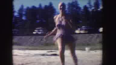 South Dakota (1954): People In Bathing Suits Play On The Beach And In The Water