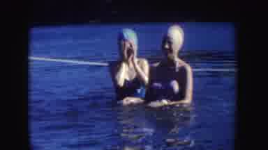 South Dakota (1954): Two Woman Having Fun In The Water Playing And Swimming