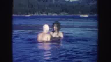 South Dakota (1954): Two Girls Swimming In A Lake With Weed Hair Laughing