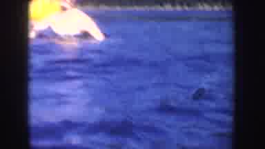 South Dakota (1954): A Woman In A Red Bathing Suit And Cap Throwing A Weed And