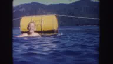 South Dakota (1954): Children Swimming In A Lake Together During The Summer With