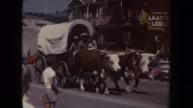 South Dakota (1954): Celebration With Ox Cart And Man On Horseback And Woman In