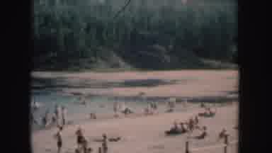 South Dakota (1954): A Large Crowd Sun Batting In The River Having Fun
