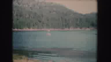 South Dakota (1954): A View Of A Mountain Rage Forest With A Lake And A Guy With