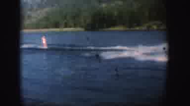 South Dakota (1954): Jet Skiing On A Lake With Sunshine And Skier Bends Down At