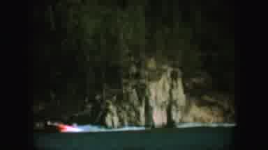 South Dakota (1954): Boat Carrying People Windsurfing On A Sunny Day At The Beach