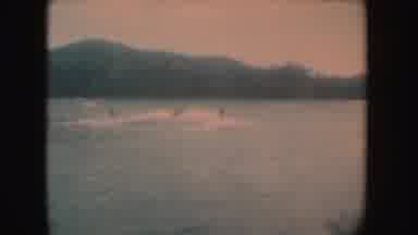 South Dakota (1954): Riding The Calming Waves Lakeside During The Day And Sunset