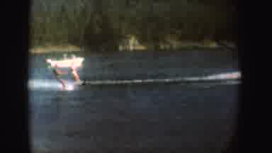 South Dakota (1954): Two White Men Surf On The Water As It Glides On