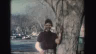 South Dakota (1954): A Woman With Her Right Arm In A Cast Leaning Against A Tree