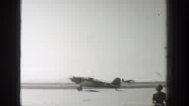 Wyoming (1939): A Beautiful Lady Is Watching And Guiding Airplanes That Are Taking