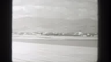 Wyoming (1939): Aerial Viewing Of Mountains Valleys And Buildings Of A Town From A