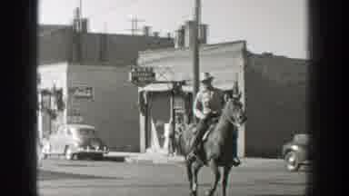Wyoming (1939): A Cowboy Riding A Horse And Then Another Scene Of Two Cowboys