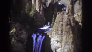 Wyoming (1939): Beautiful Scenic Waterfall Falling From A River High In The