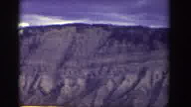 Wyoming (1939): A Group Of People In A Mountain Region Getting In A Car