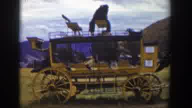 Wyoming (1939): A Rickety Cart Packed In Front Of A Large Court Building
