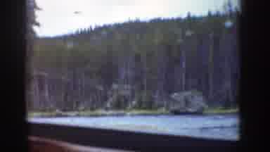 Wyoming (1939): Driving Downs Road Passed A River In The Mountains