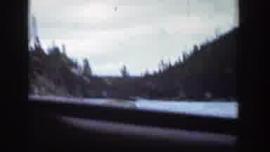Wyoming (1939): Approaching And Passing Views Of Green Trees And Blue Water On A