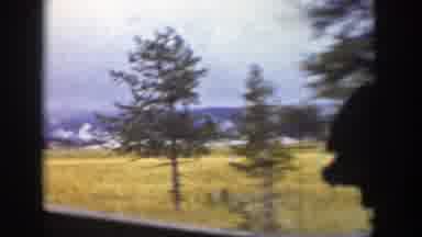 Wyoming (1939): Person Inside A Train Shows The Landscape And The Fields Outside