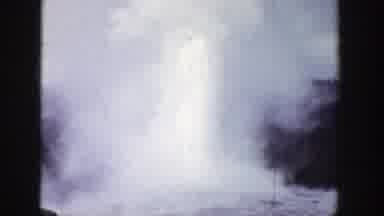 Wyoming (1939): Geyser Launching Steam Into The Air In A Big Cloud In A Forest Or