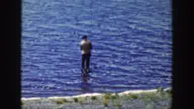 Wyoming (1939): A Man Fishing In A Very Blue Lake