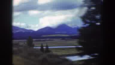 Wyoming (1939): View From A Train Window As It Passes A Car In The Countryside