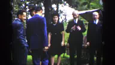 Wyoming (1939): People Dressed In Black Or Blue Dresses And Suits Formal Outside