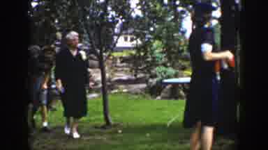 Wyoming (1939): Four Women Walk In Line On Green Grass On A Clear Day