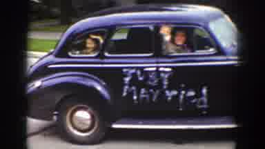 Wyoming (1939): Newly Married Couple Drives Away In A Chrysler Wedding Car