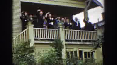 Wyoming (1939): A House With A Green Area Where People Are On The Balcony Waving