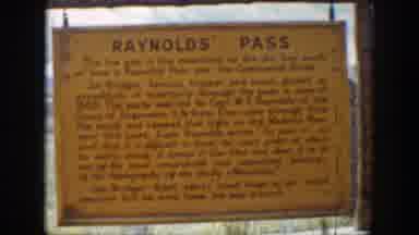 Wyoming (1939): A Yellow Antique Sign Of The Entrance Of The Reynolds Pass With