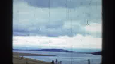Wyoming (1939): View Of Mountains And Blue Ocean Water On A Cloudy Day