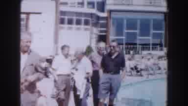 Miami Florida (1960): Men Standing In A Pool They Are Walking Laughing And Talking