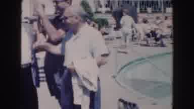 Miami Florida (1960): A Group Of Men Standing Near A Swimming Pool Waving With