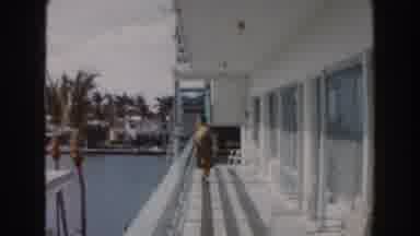 Miami Florida (1960): An Elderly Woman Walking In The Balcony Near The Pool