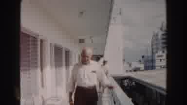 Miami Florida (1960): Balding Old Man Walking Down Outdoor Hotel Hallway