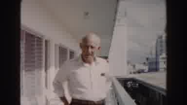 Miami Florida (1960): Elderly Man In White Shirt Standing On Balcony In The City